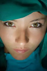 Woman with Glowing Skin in a Green Shawl