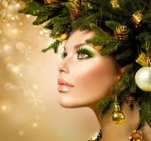 Model Wearing a Wreath in Front of a Gold Background
