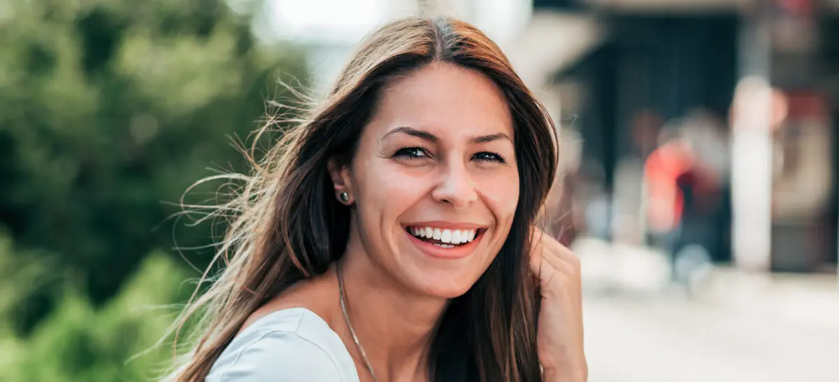 Woman smiling after lip injections