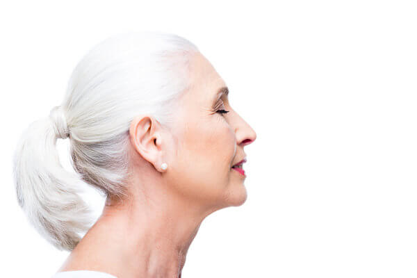 Profile of Woman with White Hair in Ponytail